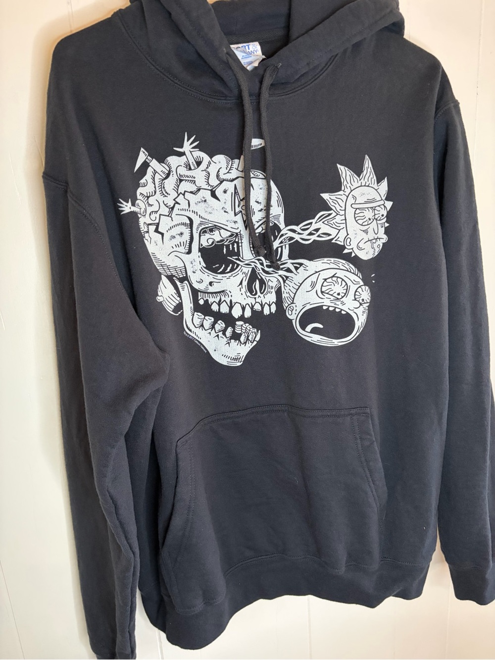 This is a‎ black Rick & Morty Skull with R&M Eyes Pullover Hoodie Size L